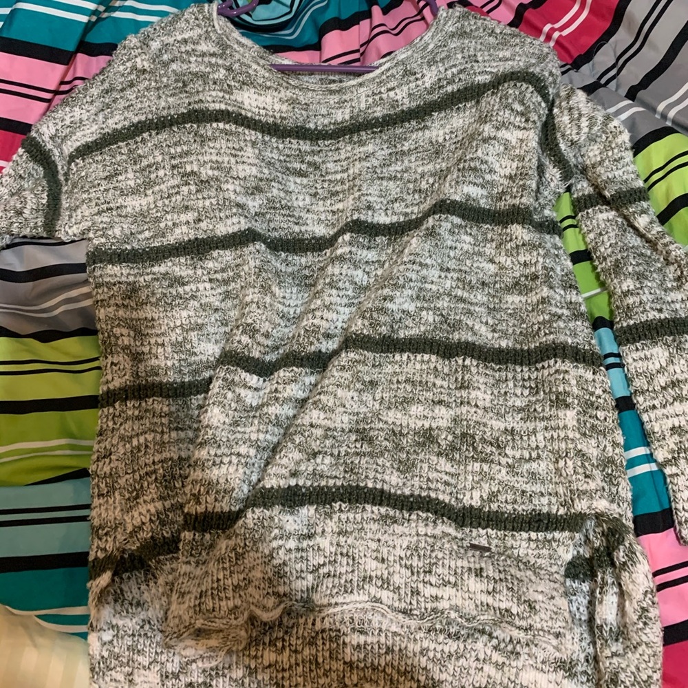 Green and white sweater